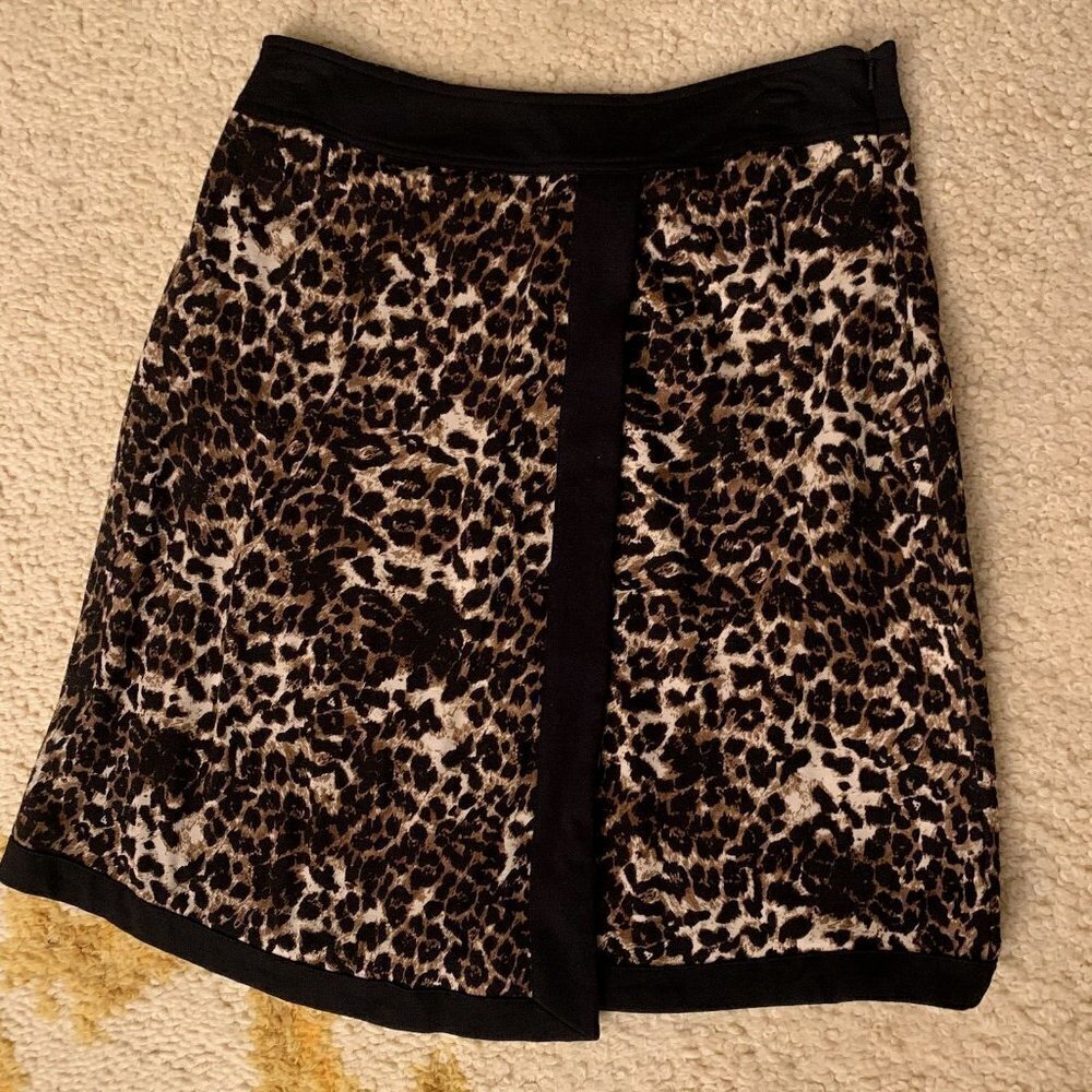 Virtue. Size 4. NWOT $50.  Faux Wrap Short Skirt. Stretch Animal Print. B60